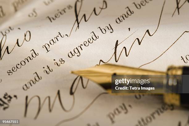 fountain pen on a legal document - antique fountain pen stock pictures, royalty-free photos & images