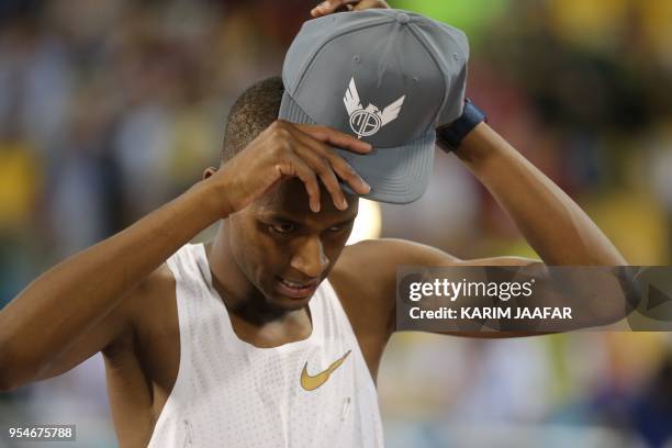 Qatar's Mutaz Essa Barshim reacts as he competes in the men's high jump during the Diamond League athletics competition at the Suhaim bin Hamad...