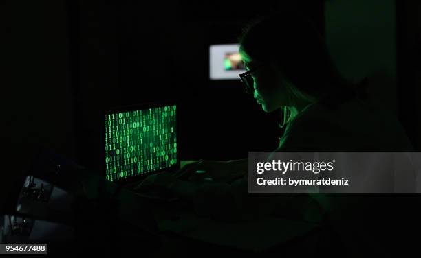 woman with hacker attack - terrorism security stock pictures, royalty-free photos & images