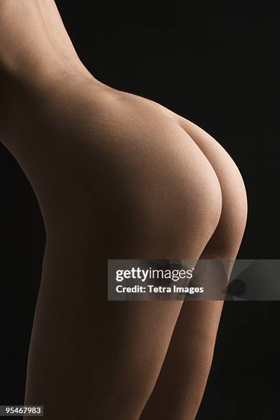 nude woman's bottom - bare bottom women stock pictures, royalty-free photos & images