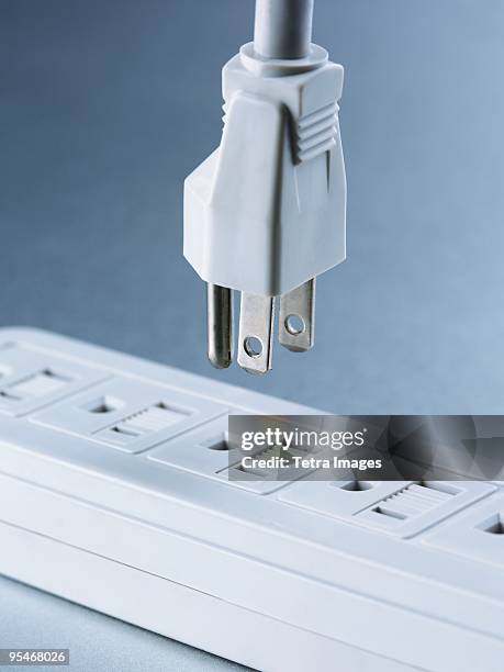 electrical plug and power bar - steckerleiste stock-fotos und bilder
