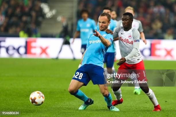 Valere Germain of Marseille and Diadie Samassekou of Salzburg during the Semi Final Second Leg Europa League match between RB Salzburg and Marseille...
