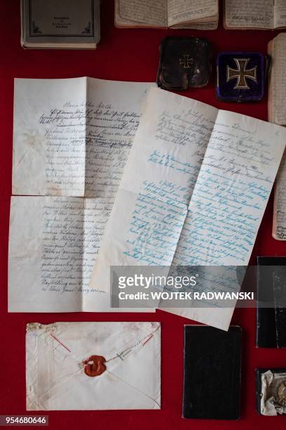 Documents and other personal belongings of Graf Hans Joachim von Finckenstein are seen on May 4, 2018 in Ilawa, northern Poland. - "This is a very...