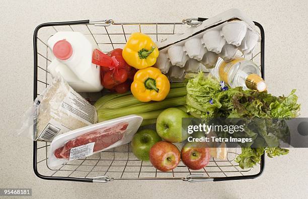 basket of groceries - eggs basket stock pictures, royalty-free photos & images