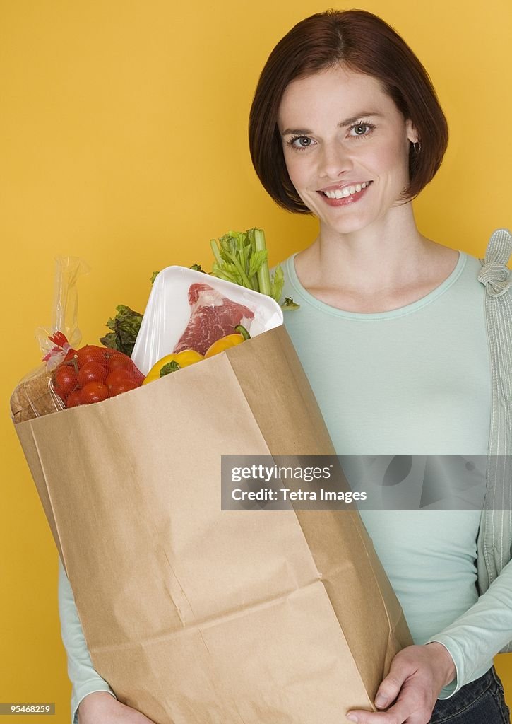 Woman carrying groceries