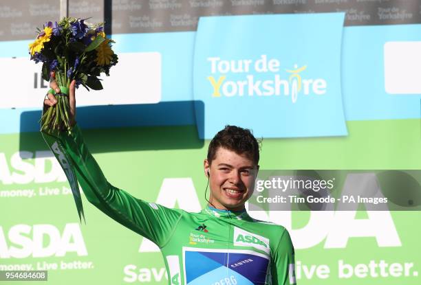 Canyon Eisberg's Harry Tanfield with the points jersey on the podium at the finish line of stage two at the Cow and Calf, near Ilkley, during day two...