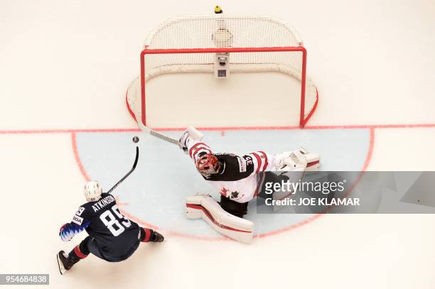 United States' Cam Atkinson scores for victory during the group B match US vs Canada of the 2018 IIHF Ice Hockey World Championship at the Jyske Bank...