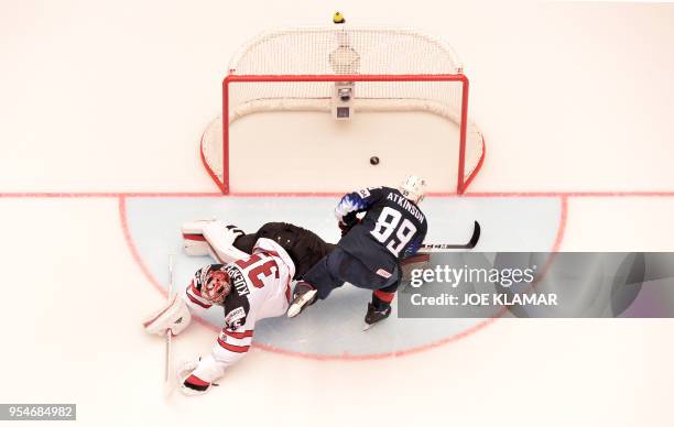 United States' Cam Atkinson scores for victory during the group B match US vs Canada of the 2018 IIHF Ice Hockey World Championship at the Jyske Bank...