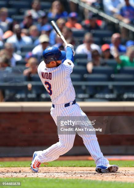 Tomas Nido of the New York Mets bats during the game against the Atlanta Braves at Citi Field on Thursday, May 3, 2018 in the Queens borough of New...