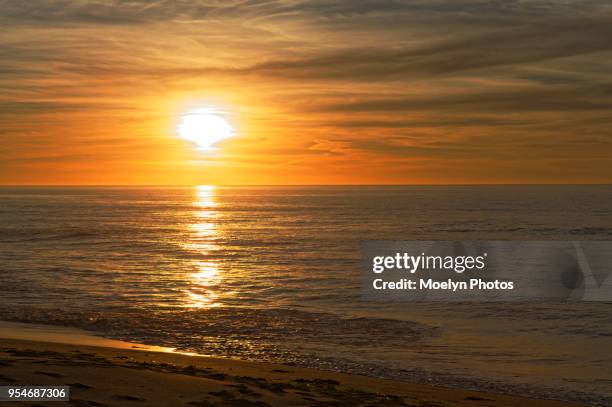 sunset at moss landing - moss landing stock pictures, royalty-free photos & images