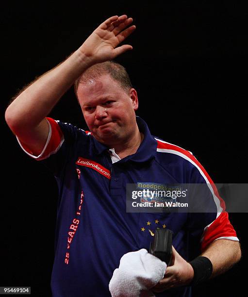 Raymond van Barneveld of Netherlands celebrates winning against Brendan Dolan of Northern Ireland during the 2010 Ladbrokes.com World Darts...