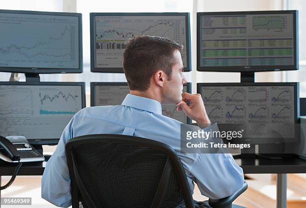 male trader at work - trader ストックフォトと画像
