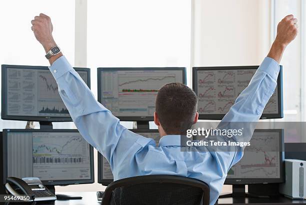 Trading Man With Computer Man At Computer Multiple Screens Photos and Premium High Res Pictures ...