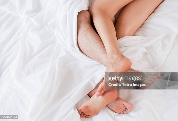 couple under sheets - 性交 ストックフォトと画像