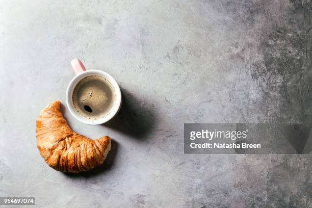 coffee with croissant - croissant viennoiserie stock-fotos und bilder