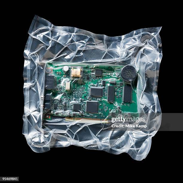 shrink wrapped circuit board - vacuum packed stock pictures, royalty-free photos & images