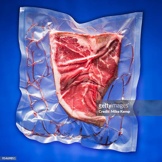 shrink wrapped steak - vacuum packed stock pictures, royalty-free photos & images