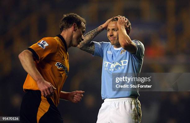 Dejected Craig Bellamy of Manchester City reacts during the Barclays Premier League match between Wolverhampton Wanderers and Manchester City at...