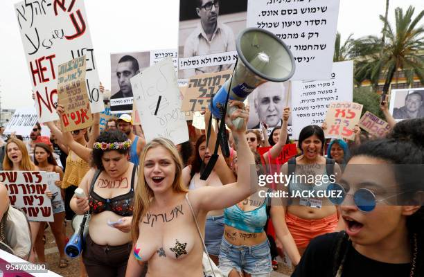 Graphic content / Participants of the annual "SlutWalk" march through the Israeli Mediterranean coastal city of Tel Aviv on May 4, 2018 to protest...