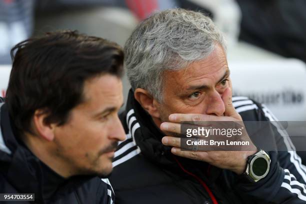 Jose Mourinho, manager of Manchester United speaks with his assistant Rui Faria before the Premier League match between Brighton and Hove Albion and...