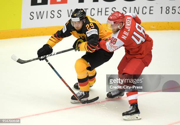 Leon Draisaitl of Team Germany and Nicholas Jensen of Team Danmark during the World Championship game between Germany and Denmark at Jyske Bank Boxen...