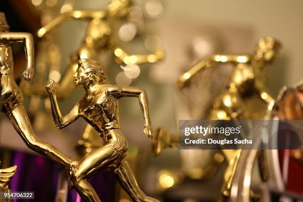 collection of awards and trophy's of athletic success - wacky races stock pictures, royalty-free photos & images