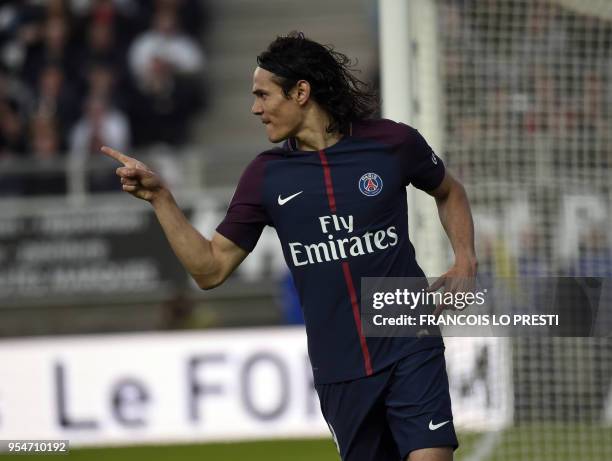 Paris Saint-Germain's Uruguayan forward Edinson Cavani jubilates after scoring during the French L1 football match between Amiens and PSG on May 4,...