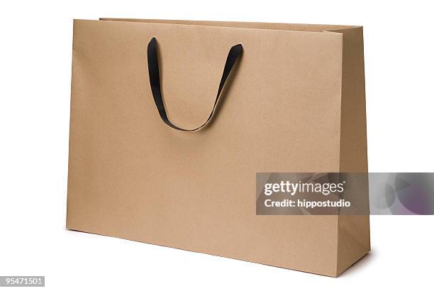 brown craft paper bag - shopping bag stock pictures, royalty-free photos & images