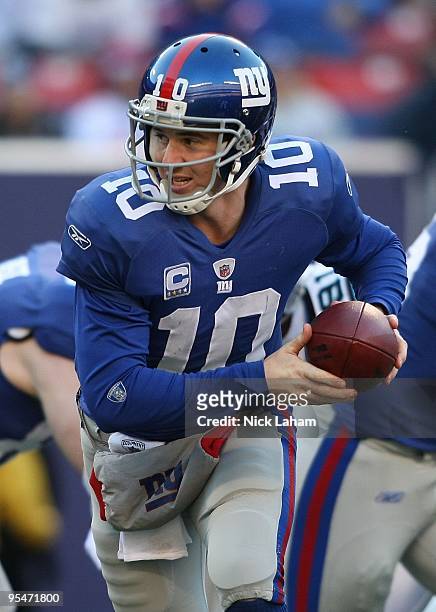 Eli Manning of the New York Giants against the Carolina Panthers at Giants Stadium on December 27, 2009 in East Rutherford, New Jersey.