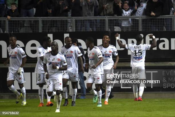 Amien's Moussa Konate jubilates after scoring during the French L1 football match between Amiens and PSG, on May 4, 2018 at the Licorne stadium in...