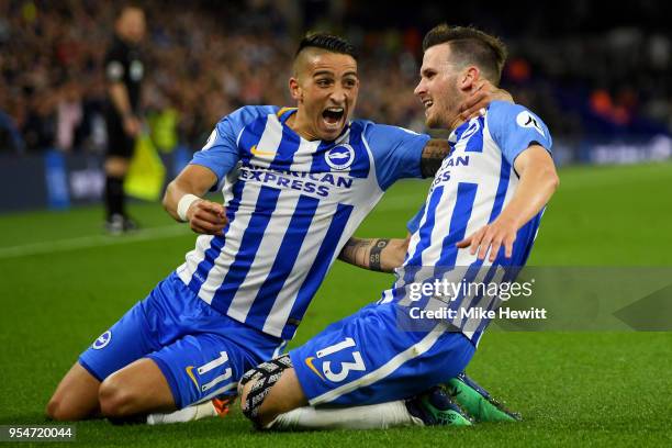 Pascal Gross of Brighton & Hove Albion celebrates with team-mate Anthony Knockaert after scoring the opening goal during the Premier League match...