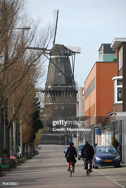 windmill for brewery - amsterdam windmill stock pictures, royalty-free photos & images