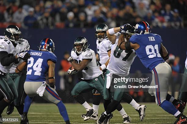 Running back LeSean McCoy of the Philadelphia Eagles runs the ball during the game against the New York Giants on December 13, 2009 at Giants Stadium...