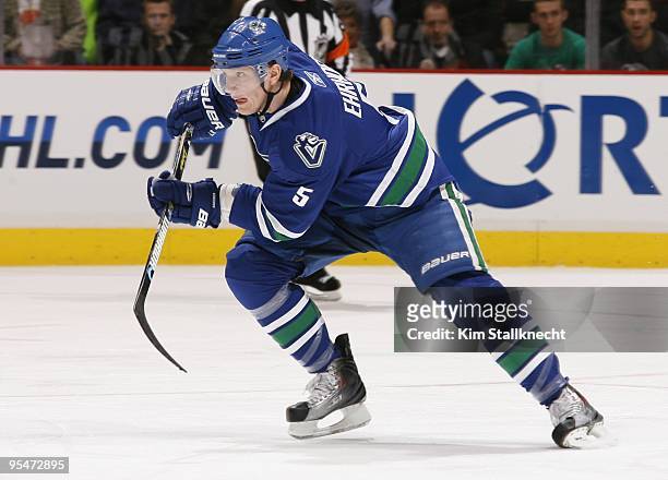 Christian Ehrhoff of the Vancouver Canucks skates up ice during NHL action against the Edmonton Oilers on December 26, 2009 at General Motors Place...