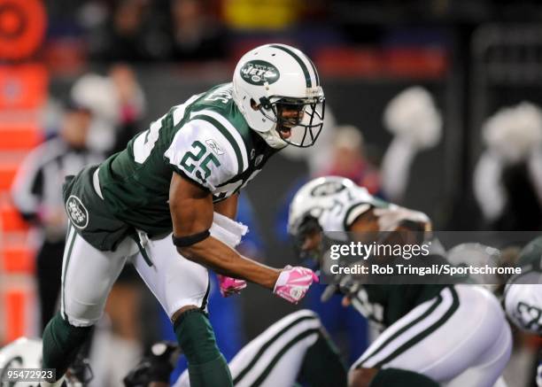 Kerry Rhodes of the New York Jets reacts after a defensive play against the Buffalo Bills at Giants Stadium on October 18, 2009 in East Rutherford,...