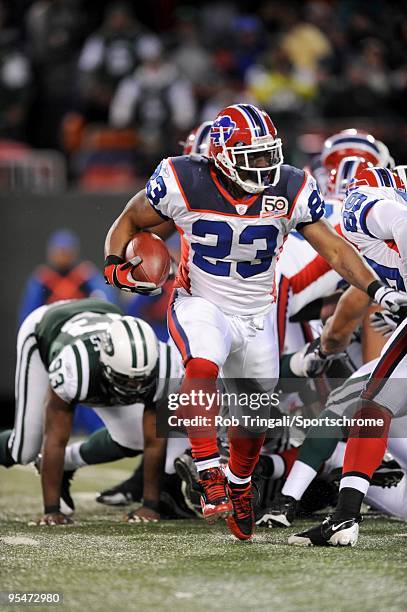 Marshawn Lynch of the Buffalo Bills rushes against the New York Jets at Giants Stadium on October 18, 2009 in East Rutherford, New Jersey. The Bills...