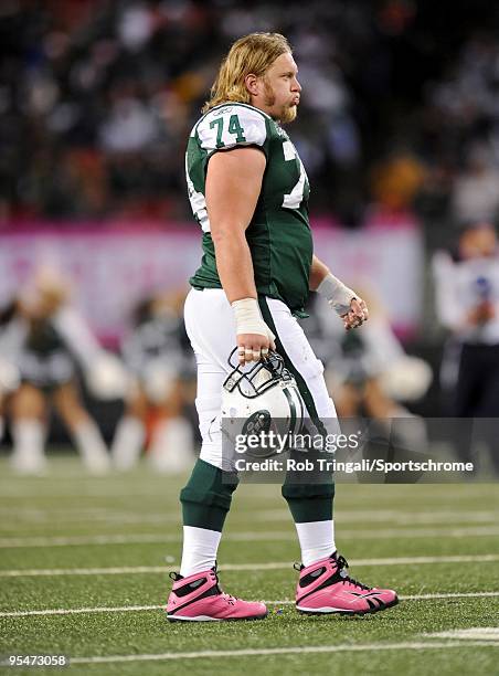 Nick Mangold of the New York Jets looks on against the Buffalo Bills at Giants Stadium on October 18, 2009 in East Rutherford, New Jersey. The Bills...