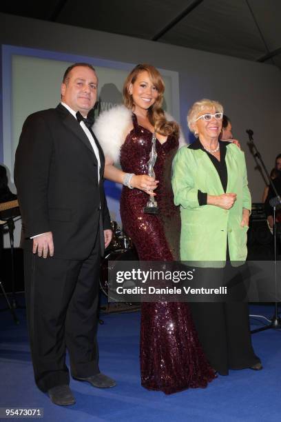 Pascal Vicedomini, Mariah Carey and Lina Wertmuller attend the second day of the 14th Annual Capri Hollywood International Film Festival on December...