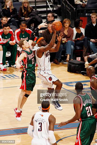 Ronald "Flip" Murray of the Charlotte Bobcats on the jumpshot against Luke Ridnour of the Milwaukee Bucks on December 28, 2009 at the Time Warner...