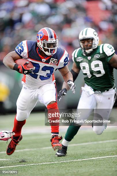 Marshawn Lynch of the Buffalo Bills rushes against the New York Jets at Giants Stadium on October 18, 2009 in East Rutherford, New Jersey. The Bills...