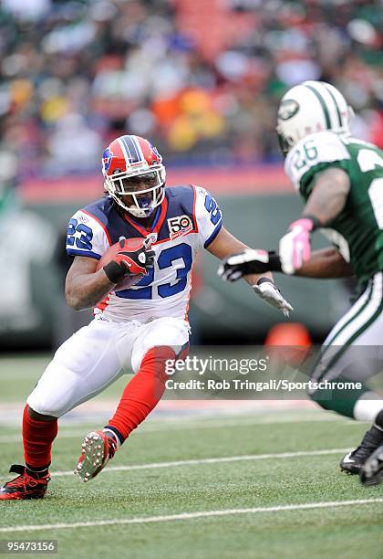 Marshawn Lynch of the Buffalo Bills rushes against the New York Jets at Giants Stadium on October 18, 2009 in East Rutherford, New Jersey. The Bills...