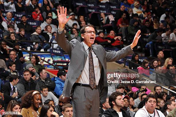 Kiki Vandeweghe Head Coach of the New Jersey Nets instructs his team during the game against the Oklahoma City Thunder on December 28, 2009 at the...