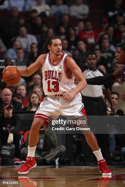 Joakim Noah of the Chicago Bulls handles the ball against the Sacramento Kings during the game on December 21, 2009 at the United Center in Chicago,...