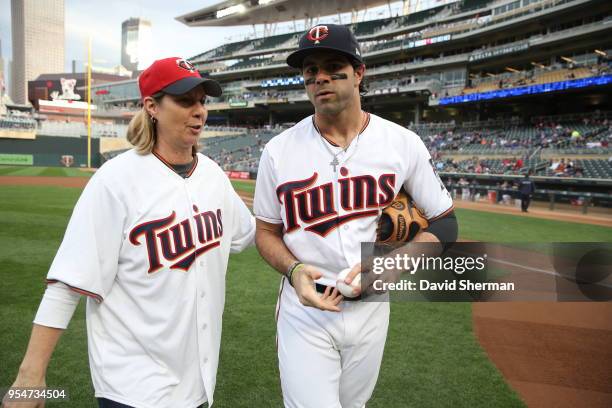 Head Coach Cheryl Reeve of the Minnesota Lynx throws out the first pitch to Ryan LaMarre of the Minnesota Twins at the Minnesota Twins game on May 1,...