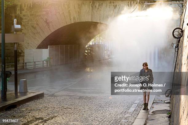 a girl by the seine - joseph o. holmes stock pictures, royalty-free photos & images
