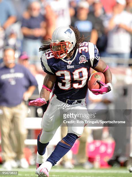 Laurence Maroney of the New England Patriots rushes against the Baltimore Ravens at Gillette Stadium on October 4, 2009 in Foxboro, Massachusetts....