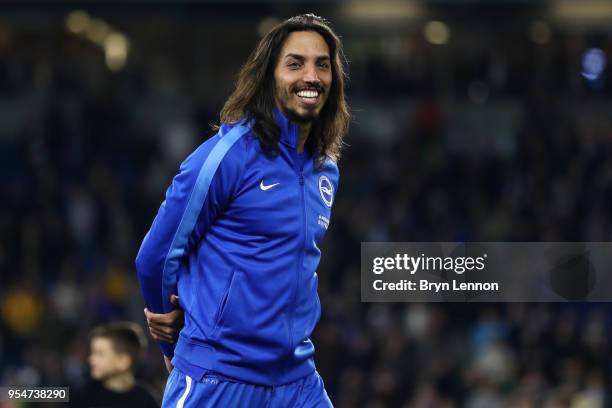Matias Ezequiel Schelotto of Brighton & Hove Albion celebrates with team-mates on the pitch after the Premier League match between Brighton and Hove...