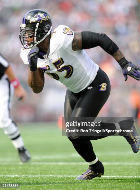 Terrell Suggs of the Baltimore Ravens defends against the New England Patriots at Gillette Stadium on October 4, 2009 in Foxboro, Massachusetts. The...