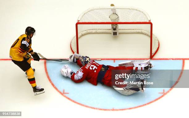 Patrick Hager of Germany fails to socre over Frederik Andersen, goalkeeper of Denmark during the 2018 IIHF Ice Hockey World Championship group stage...