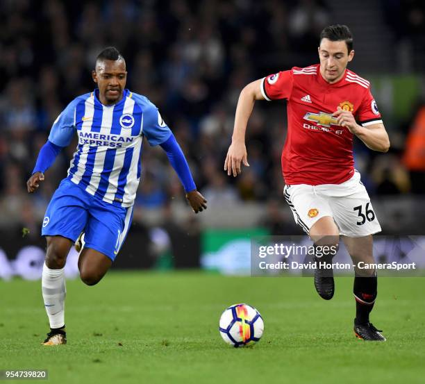 Brighton & Hove Albion's Jose Izquierdo vies for possession with Manchester United's Matteo Darmian during the Premier League match between Brighton...